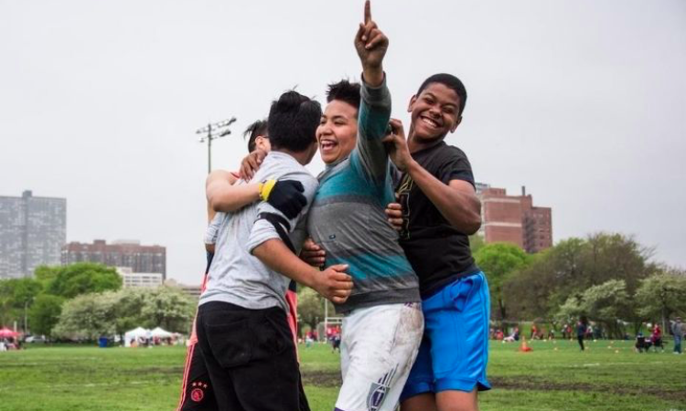 Young boys playing football, BAM
