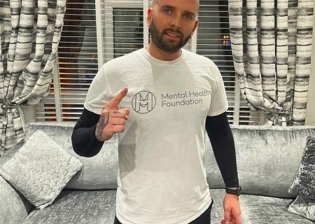 Photo of Taylor in a Mental Health Foundation tshirt